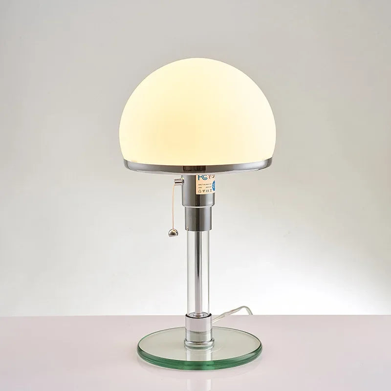 White glass sphere lamp on bedroom bedside table Nordic evening