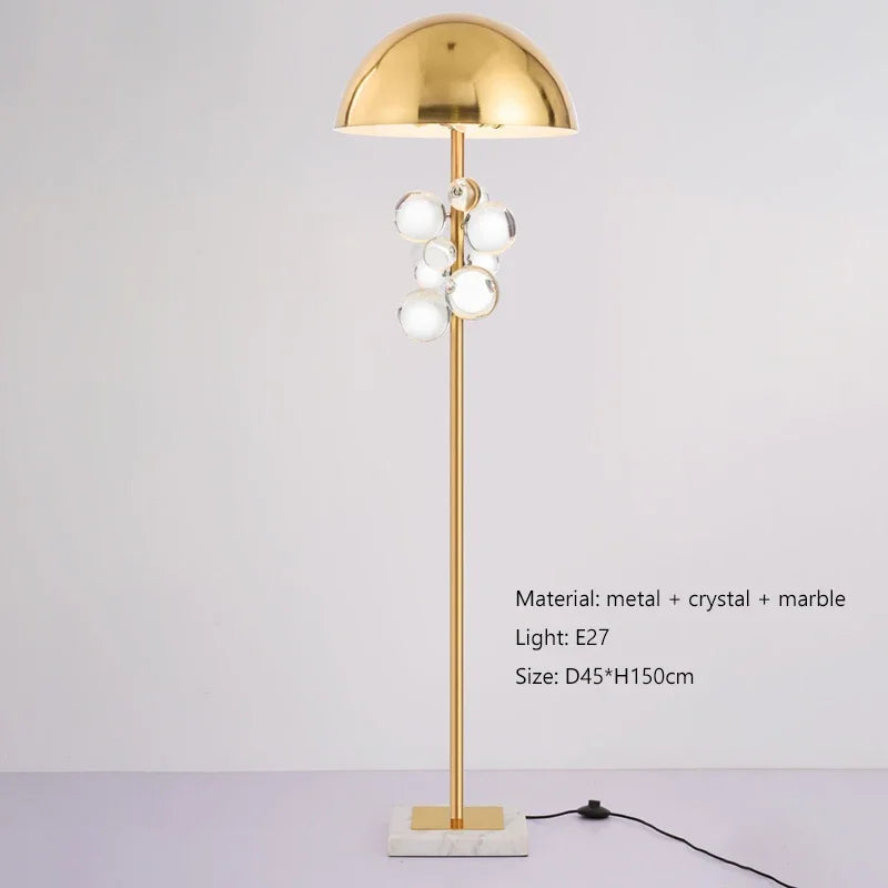 Italian designer floor lamp switched on glass ball glowing white light
