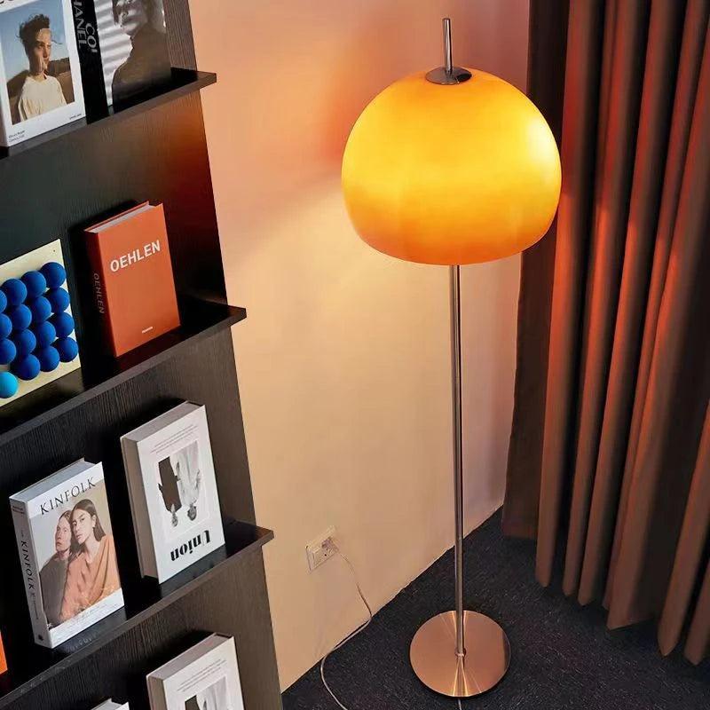 Orange glass floor lamp A variant white light in living room corner