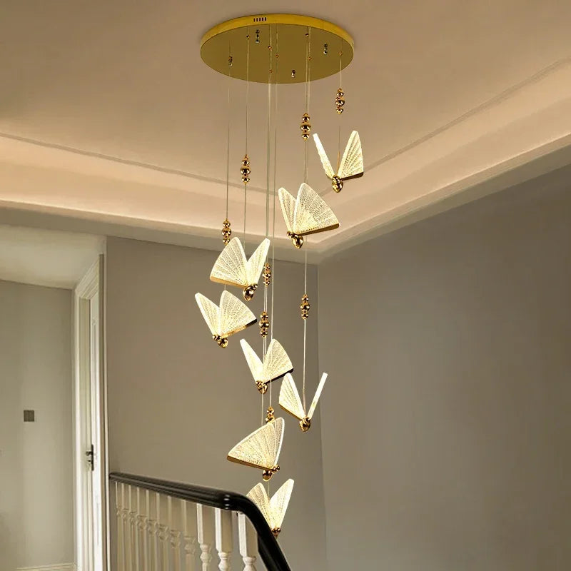 Transparent crystal butterflies suspended beneath a polished chassis
