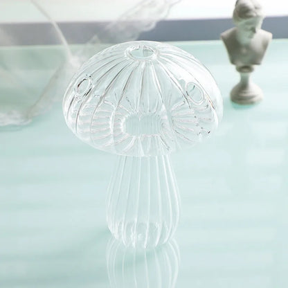 Close-up of mushroom cap detail on small glass hydroponic vase