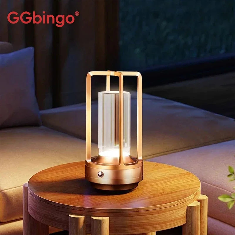 Cordless rechargeable LED night light in golden finish on dining table