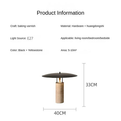 Yellow stone table lamp switched off showing raw stone texture in daylight