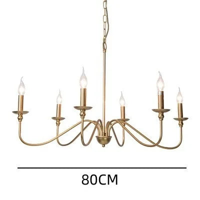 Shadeless chandelier in gold with filament style bulbs fitted to arms
