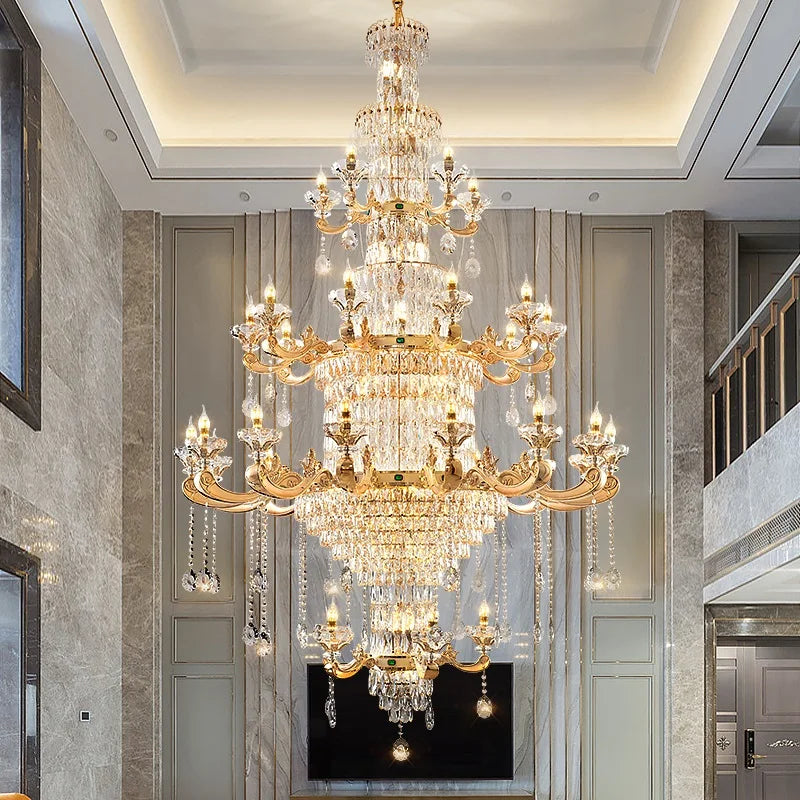 Crystal candle chandelier with tiered gold arms and faceted crystal drop strands
