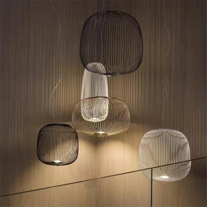 White birdcage chandelier casting a fanned pattern through its spokes
