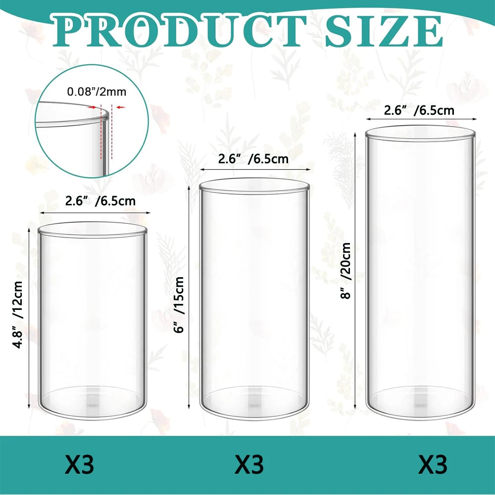 Clear glass cylinder vase close-up showing straight walls and base clarity
