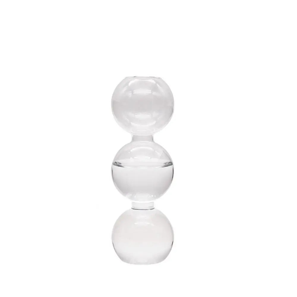 Blue glass hydroponic vase overhead shot showing open circular top and water surface