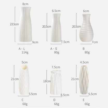 Compact white plastic flower vase for desktop display in modern interior setting