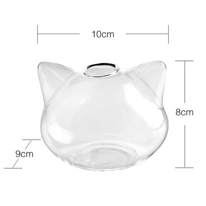 Pair of cat glass planters in two sizes displayed together on shelf