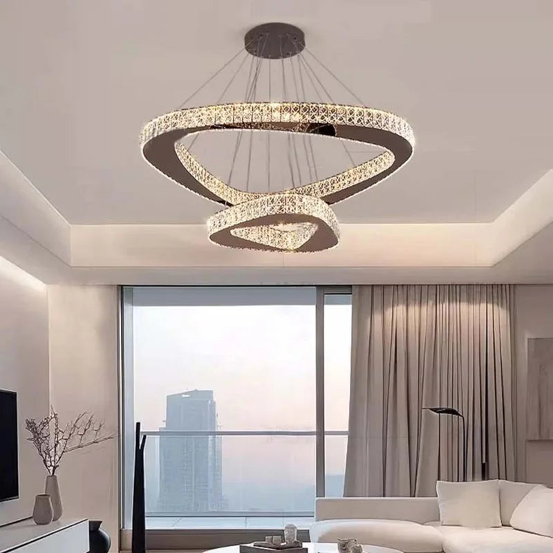 Golden crystal ring chandelier lit in warm white light