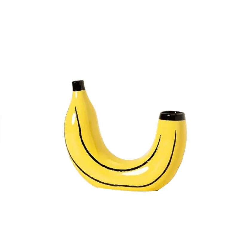 Resin banana novelty vase displayed as conversation piece on dining table