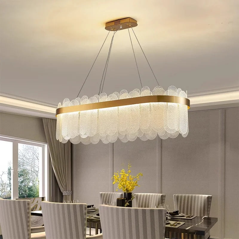 Linear glass ring chandelier at 47.2 in long on a gold iron frame