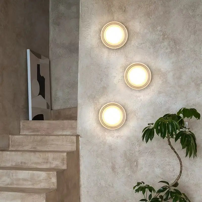 acrylic outdoor wall sconce, close-up of shade and hardware detail