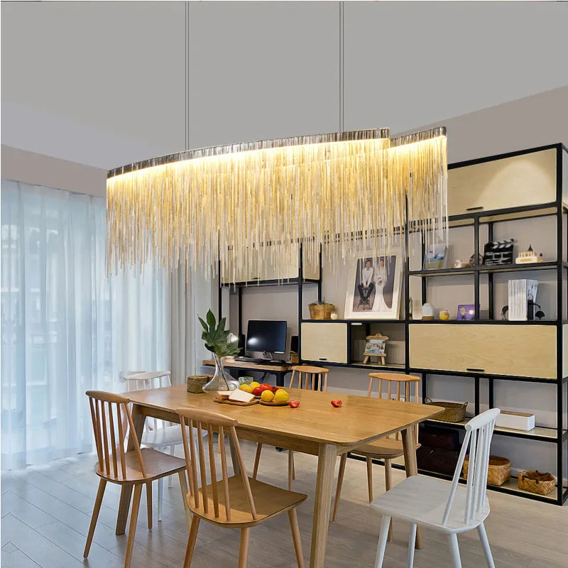 Aluminum chain detail hanging in tassels from a chandelier frame