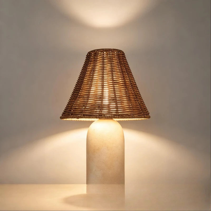 Luxury marble table lamp switched on casting soft warm glow in study room