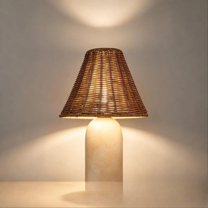 Luxury marble table lamp switched on casting soft warm glow in study room