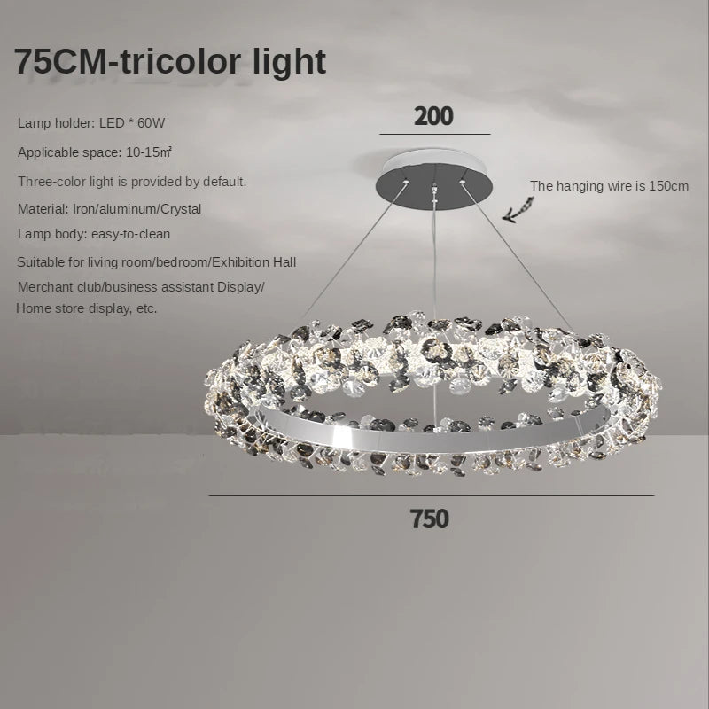 Crystal ring chandelier lit in cool white through radiating petals