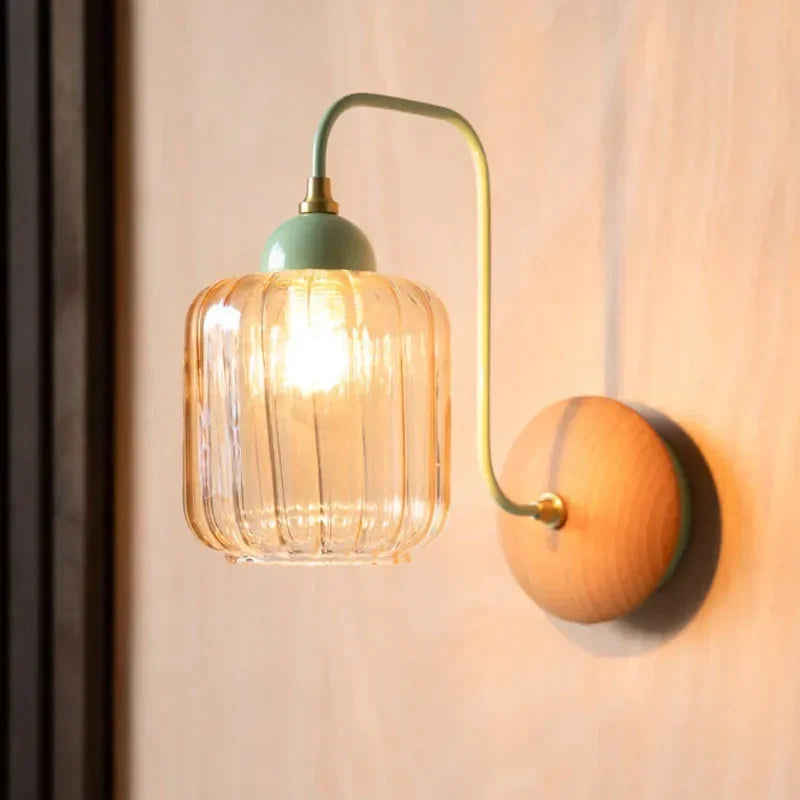 amber glass wall sconce, close-up of shade and hardware detail