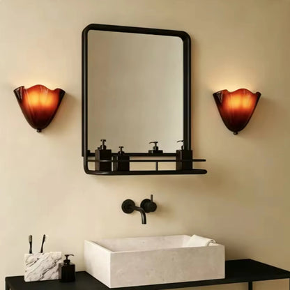 glass wall sconce, detail view of fixture base and arm