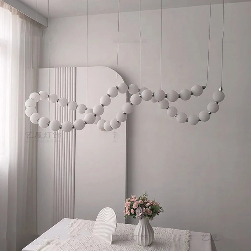 Gold linear strip chandelier at 78.7 in length on a cord pendant