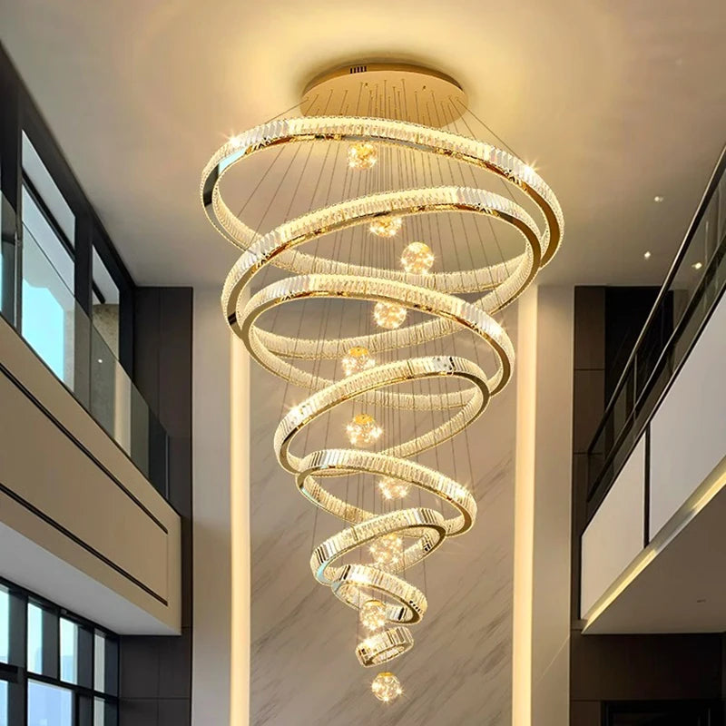Silver ring crystal chandelier descending in staggered tiers on cords
