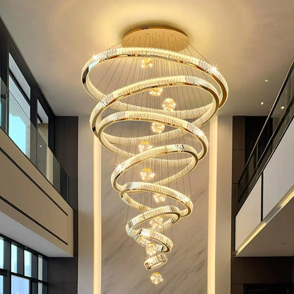 Silver ring crystal chandelier descending in staggered tiers on cords