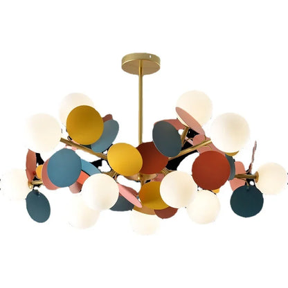 Glass shade detail on a contemporary branch chandelier with G9 sockets