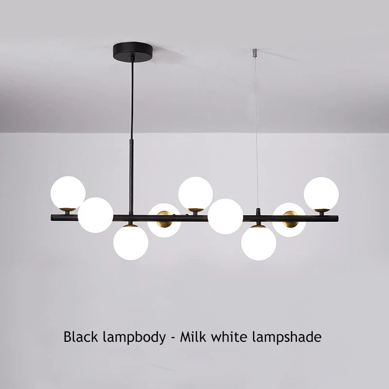 Eleven head magic bean chandelier in gold above a dining table