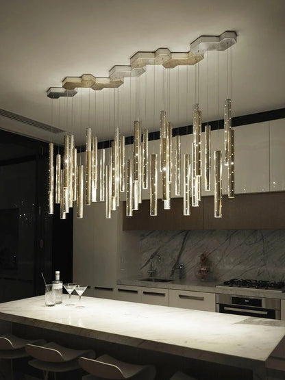Cluster of vertical plated tubes forming a modern hollowed out chandelier