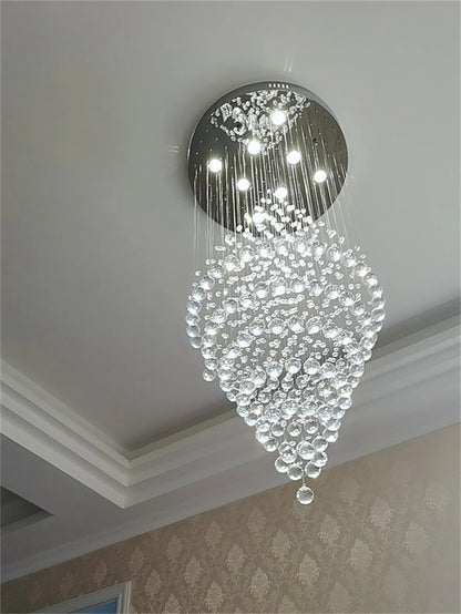 Gold shell crystal chandelier descending in concentric circles