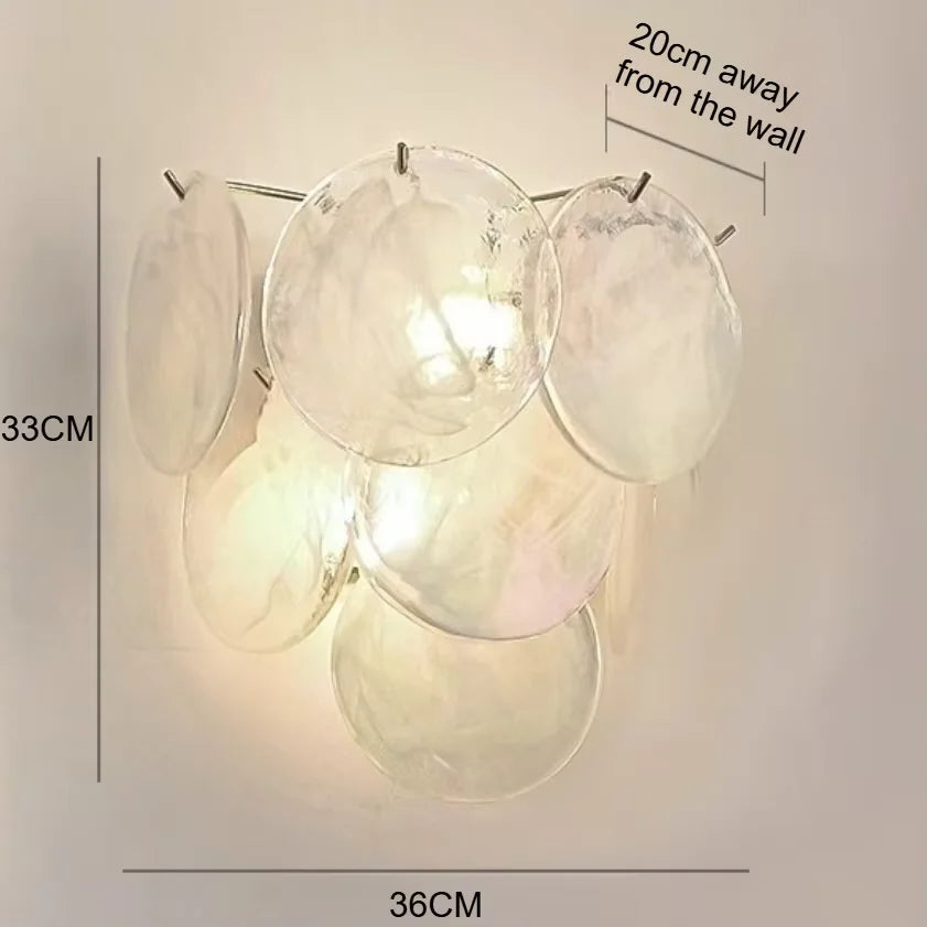 Pink stained glass chandelier in neutral 4500K light on iron