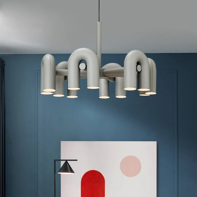 Twelve light U tube chandelier with black tube ends on polished chrome
