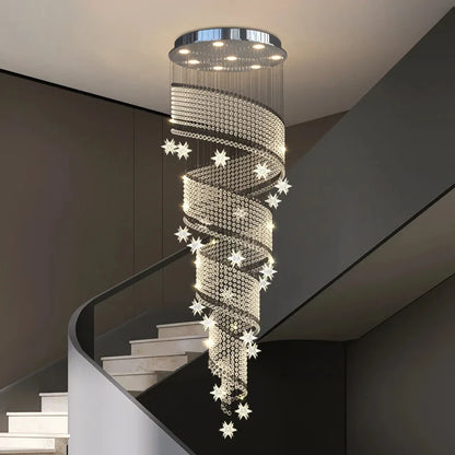 Gold lamp holder crystal chandelier lit in warm light down a void
