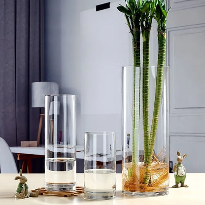 Small clear acrylic flower vase on office desk display