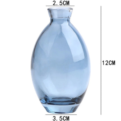 Mini glass flower vase collection in transparent and blue colorways