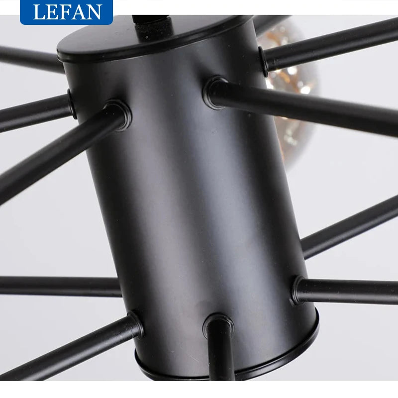 Twelve head glass ball chandelier in black with forged iron arms