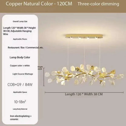 Nordic leaf chandelier shown in light yellow with iron framing