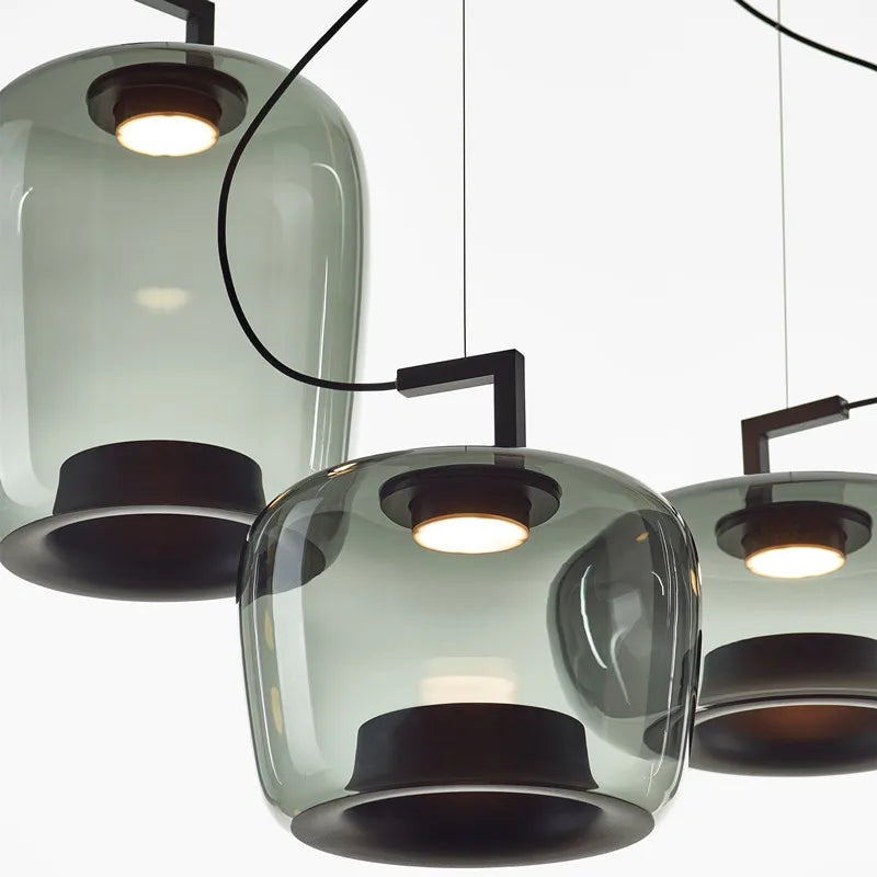 Blown glass chandelier with inner shade visible as a bright core