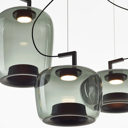 Blown glass chandelier with inner shade visible as a bright core
