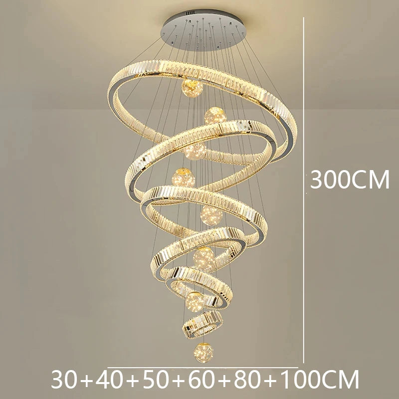 Six ring crystal chandelier in silver for a duplex stairwell