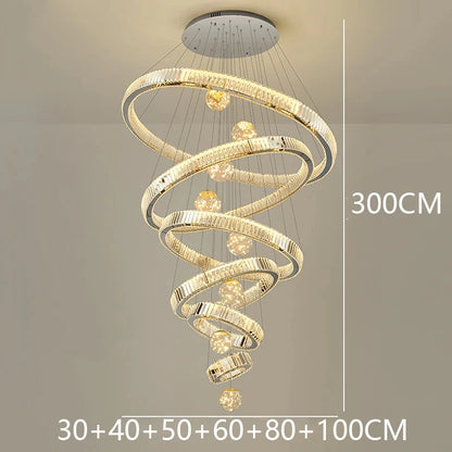 Six ring crystal chandelier in silver for a duplex stairwell