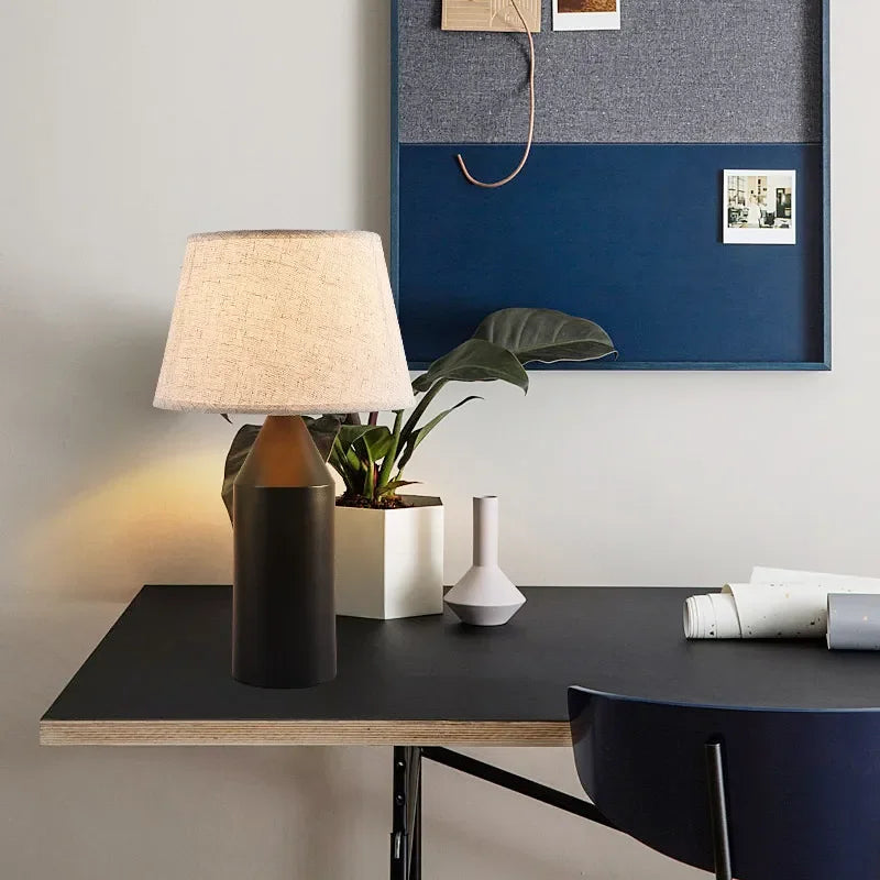 Vertical profile of minimalist white table lamp base and stem