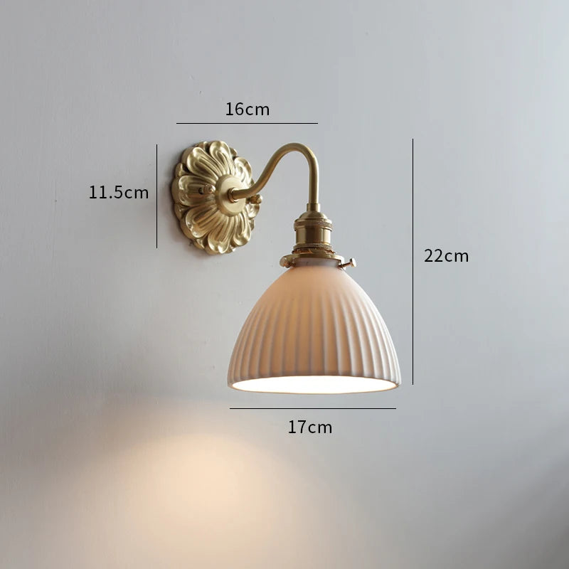 copper bathroom wall sconce, close-up of shade and hardware detail