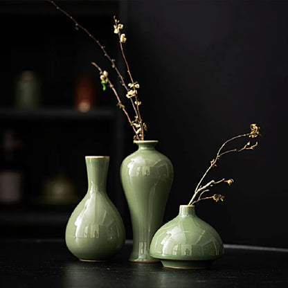 Style B small ceramic dried flower vase with eucalyptus on wooden desk