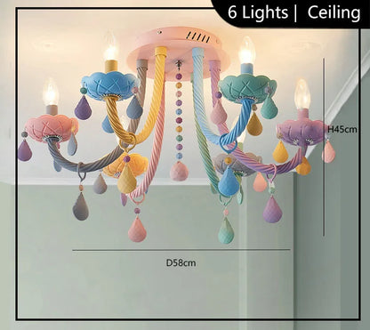 Macaron glass chandelier shown lit in warm white E14 LED light