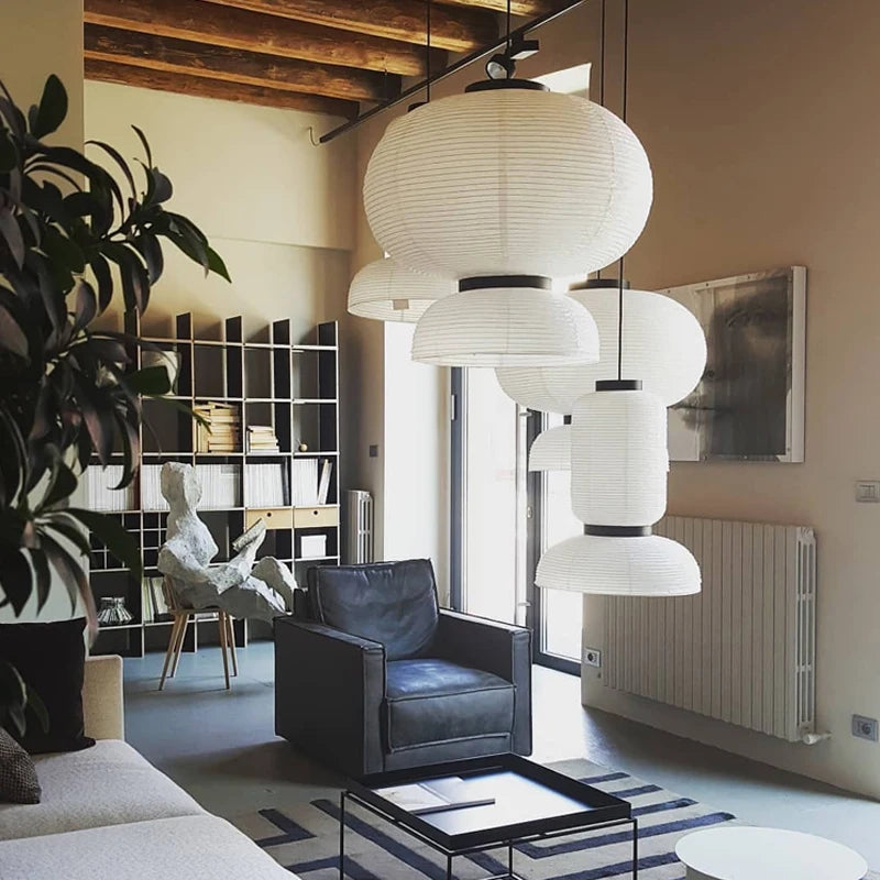 Rice paper pendant shade diffusing warm light from two included E27 bulbs