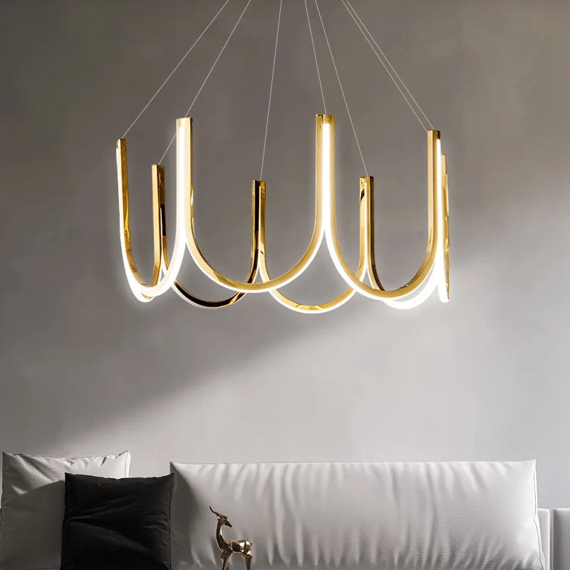 Modern U bar chandelier in gold with an acrylic and aluminum body