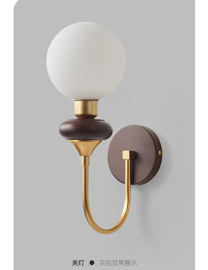glass wall sconce, installed in a room interior setting