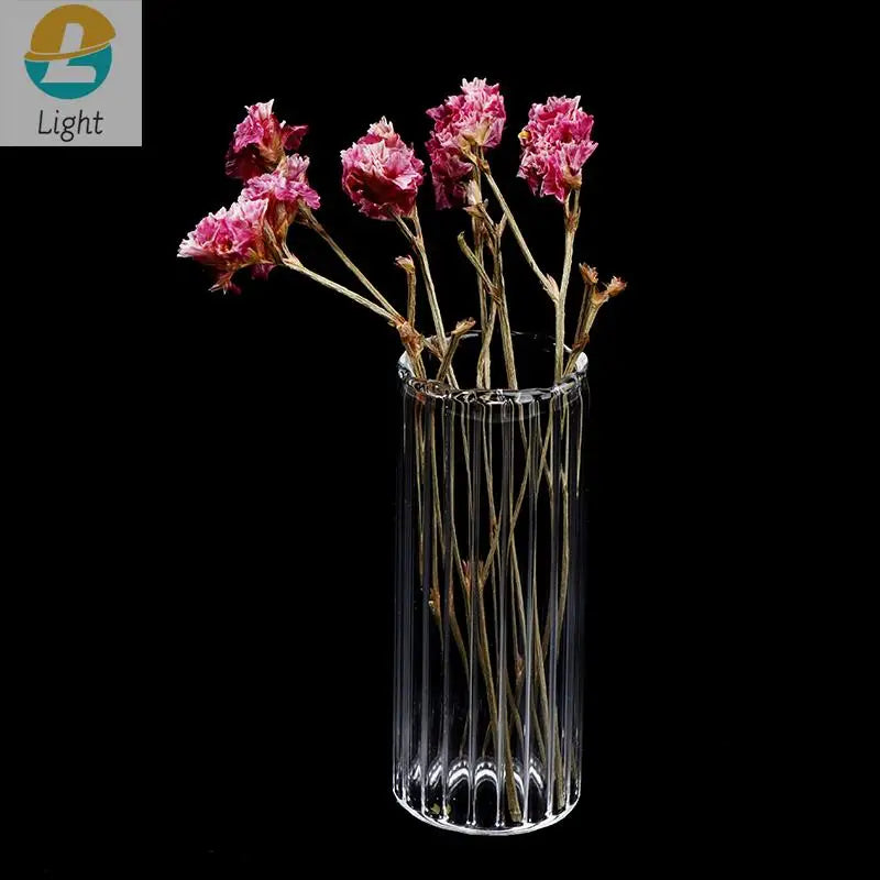 Miniature glass vase set of three displayed in dollhouse living room